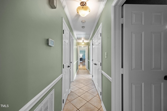 1973 Elon Ossipee Rd, Elon, NC 27244 - hallway featuring attic access, ornamental molding, and light tile patterned flooring