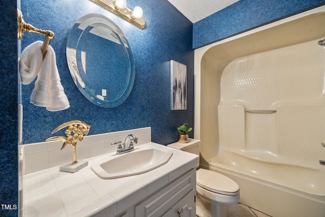 1973 Elon Ossipee Rd, Elon, NC 27244 - bathroom with vanity, toilet, and washtub / shower combination