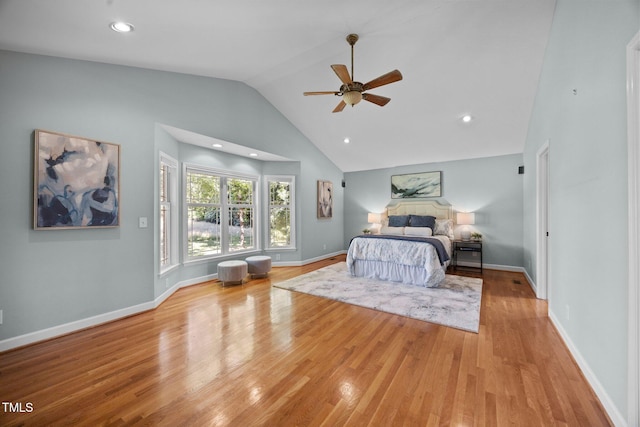 1973 Elon Ossipee Rd, Elon, NC 27244 - bedroom with vaulted ceiling, wood finished floors, recessed lighting, baseboards, and ceiling fan