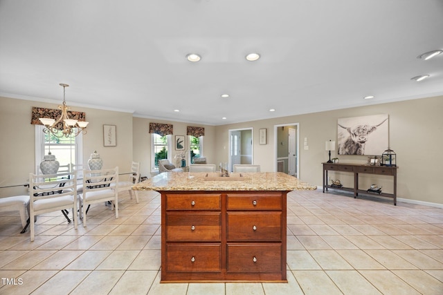 1973 Elon Ossipee Rd, Elon, NC 27244 - kitchen featuring ornamental molding, light tile patterned flooring, a chandelier, recessed lighting, and a center island