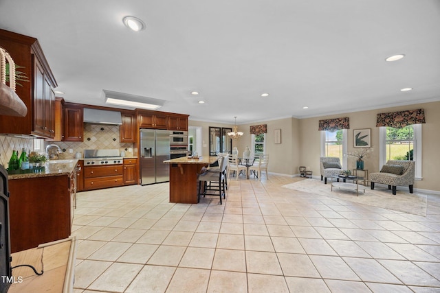 1973 Elon Ossipee Rd, Elon, NC 27244 - kitchen with stainless steel refrigerator with ice dispenser, ornamental molding, a breakfast bar, light tile patterned flooring, and backsplash