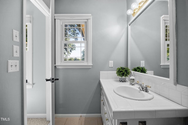 1973 Elon Ossipee Rd, Elon, NC 27244 - bathroom featuring vanity and baseboards