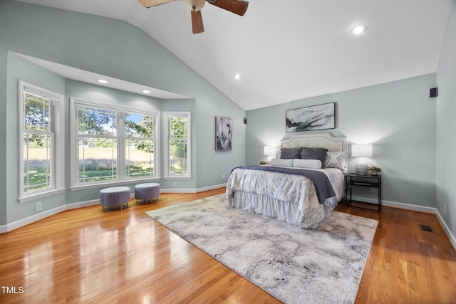 1973 Elon Ossipee Rd, Elon, NC 27244 - bedroom with lofted ceiling, wood finished floors, baseboards, a ceiling fan, and recessed lighting