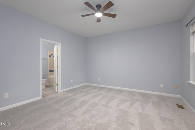 1510 Bungalow Ave, Durham, NC 27703 - unfurnished bedroom with carpet, baseboards, ensuite bathroom, and ceiling fan