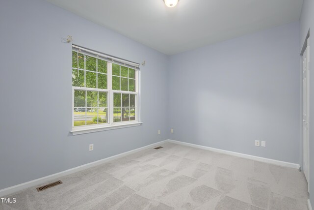 1510 Bungalow Ave, Durham, NC 27703 - unfurnished room with light colored carpet and baseboards