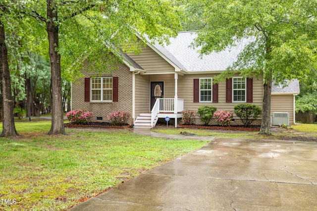 1510 Bungalow Ave, Durham, NC 27703 - view of front of property with crawl space, a front lawn, central AC unit, and a shingled roof