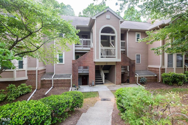 115 Abingdon Ct Unit 2B, Cary, NC 27513 - view of building exterior featuring stairway