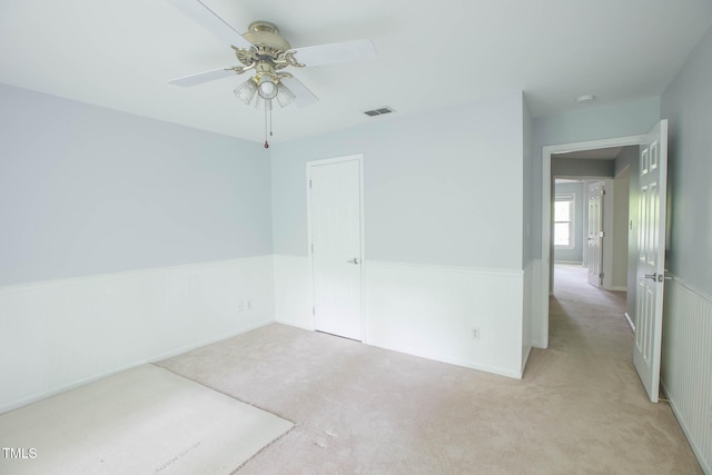 115 Abingdon Ct Unit 2B, Cary, NC 27513 - unfurnished room with carpet flooring and a ceiling fan