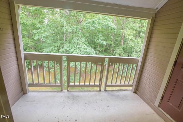 115 Abingdon Ct Unit 2B, Cary, NC 27513 - balcony featuring a wooded view