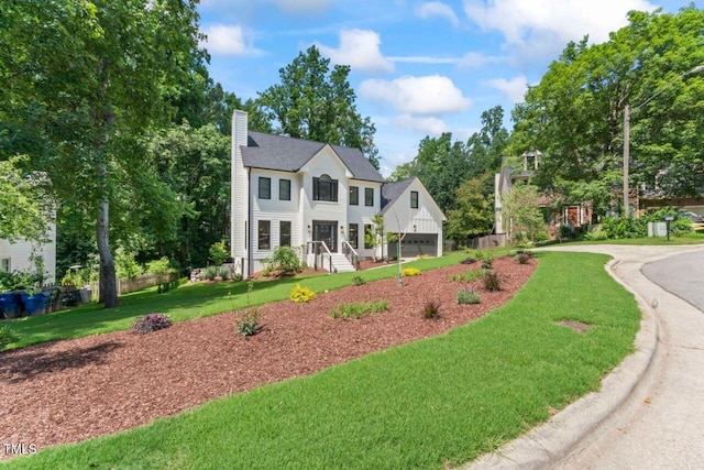 4408 Queenstown Ct, Raleigh, NC 27612 - view of front of house featuring a chimney and a garage