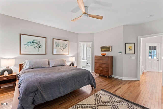 4408 Queenstown Ct, Raleigh, NC 27612 - bedroom featuring light wood finished floors, baseboards, ensuite bath, and a ceiling fan