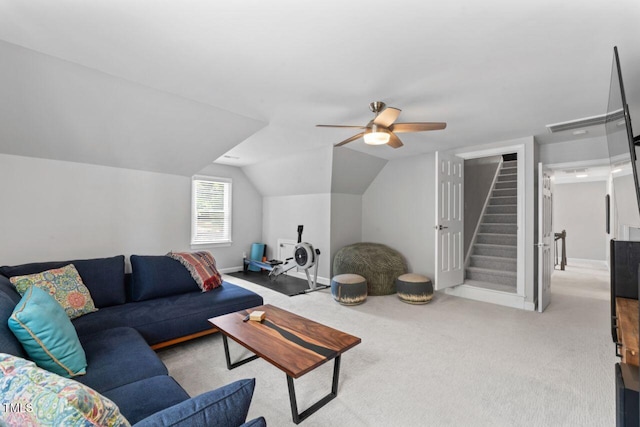 4408 Queenstown Ct, Raleigh, NC 27612 - living room with carpet floors, ceiling fan, lofted ceiling, stairway, and baseboards