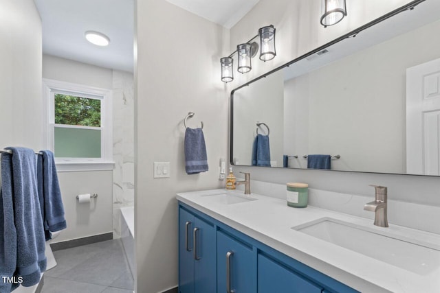 4408 Queenstown Ct, Raleigh, NC 27612 - full bath featuring tile patterned flooring, double vanity, baseboards, and shower / bathtub combination