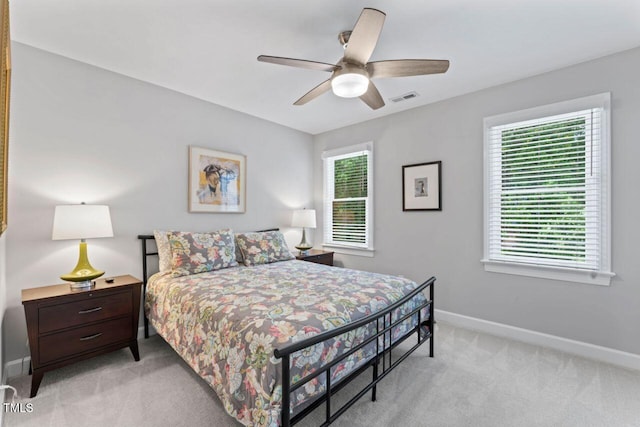 4408 Queenstown Ct, Raleigh, NC 27612 - bedroom with light carpet, baseboards, and a ceiling fan