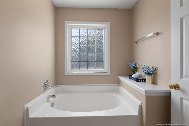 122 Van Buren Dr, Raeford, NC 28376 - bathroom featuring a garden tub