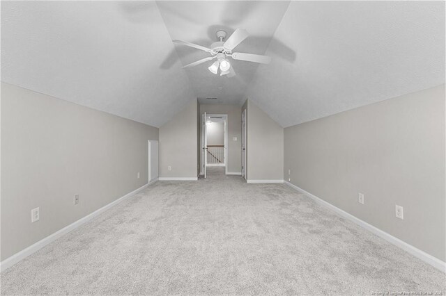 4404 Bunkers Bay Ln, Parkton, NC 28371 - additional living space featuring carpet floors, a ceiling fan, vaulted ceiling, and baseboards
