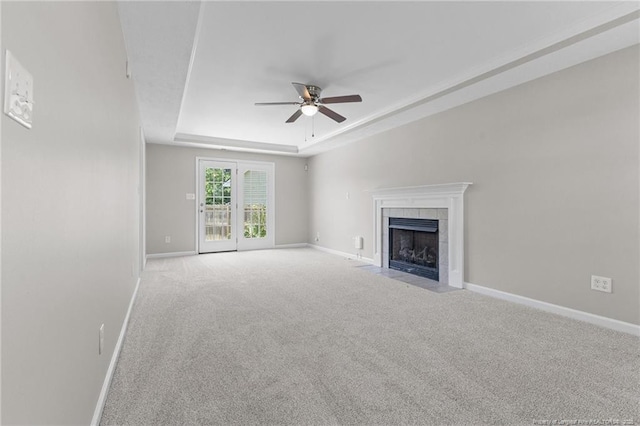 4404 Bunkers Bay Ln, Parkton, NC 28371 - unfurnished living room with a raised ceiling, a ceiling fan, carpet flooring, and baseboards