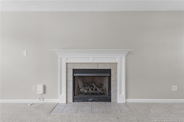 4404 Bunkers Bay Ln, Parkton, NC 28371 - detailed view of carpet, a tiled fireplace, and baseboards