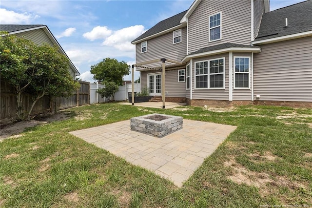 4404 Bunkers Bay Ln, Parkton, NC 28371 - back of house featuring french doors, a patio area, a fire pit, and roof with shingles