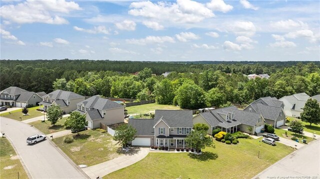 4404 Bunkers Bay Ln, Parkton, NC 28371 - aerial view of residential area featuring a forest