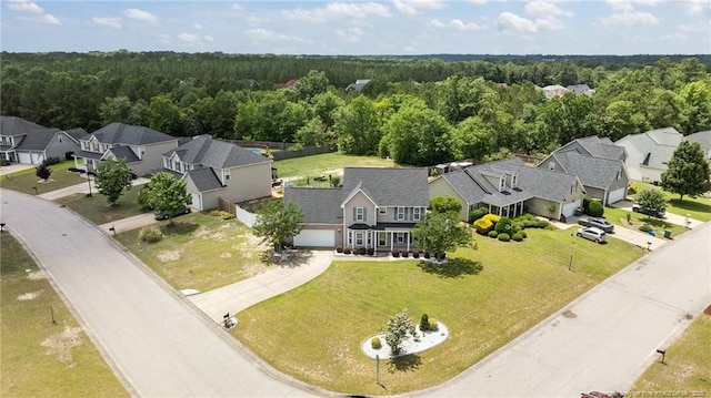 4404 Bunkers Bay Ln, Parkton, NC 28371 - aerial view of residential area with a heavily wooded area