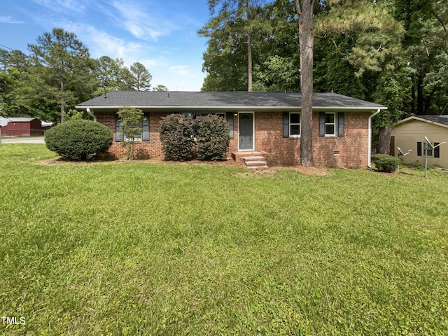 1413 Chamblee Rd, Zebulon, NC 27597 - ranch-style home featuring entry steps, brick siding, and a front lawn