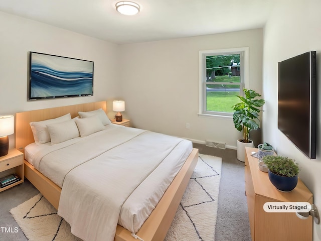 1413 Chamblee Rd, Zebulon, NC 27597 - bedroom featuring carpet floors and baseboards