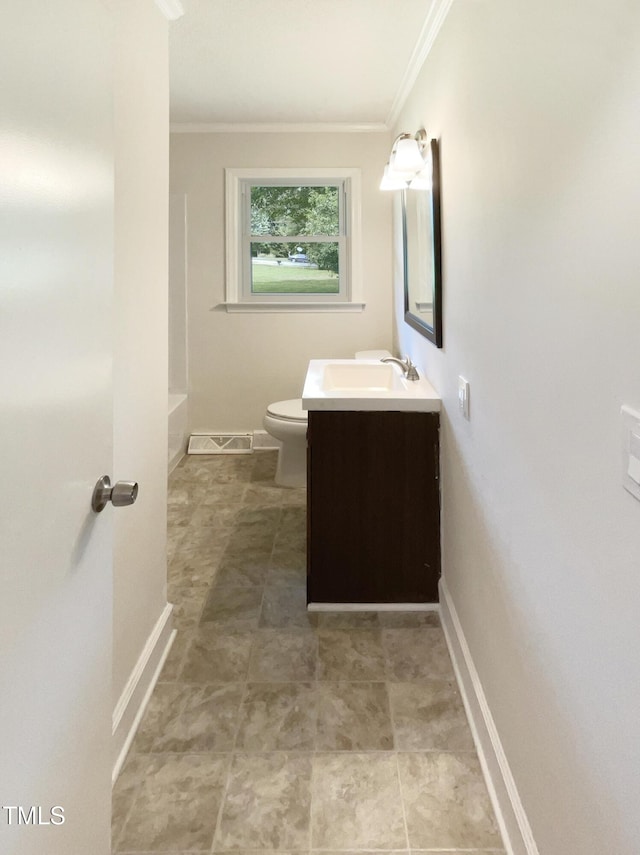 1413 Chamblee Rd, Zebulon, NC 27597 - full bathroom with ornamental molding, vanity, toilet, a bathtub, and baseboards