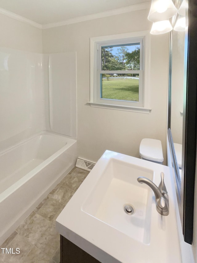 1413 Chamblee Rd, Zebulon, NC 27597 - bathroom featuring vanity, toilet, crown molding, and  shower combination