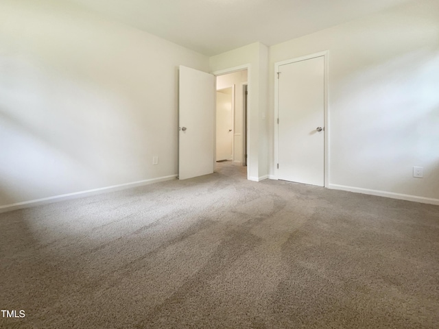 1413 Chamblee Rd, Zebulon, NC 27597 - carpeted spare room with baseboards