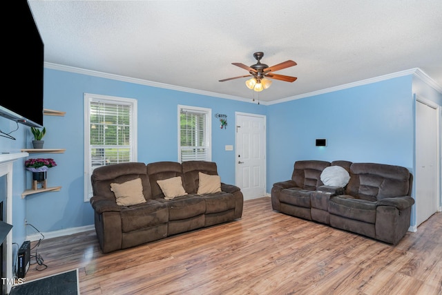 4575 Wendell Blvd, Wendell, NC 27591 - living room with wood finished floors, ceiling fan, ornamental molding, and baseboards