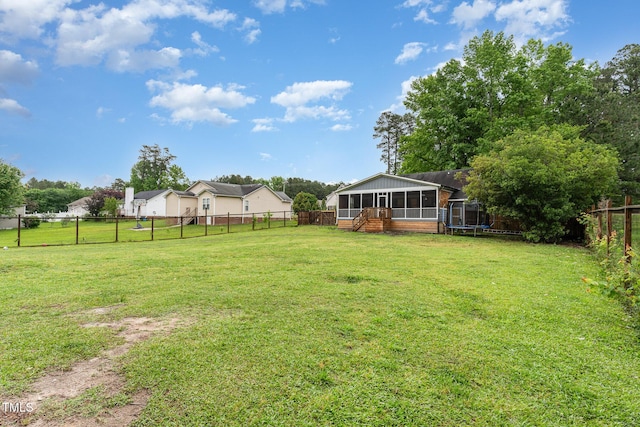 4575 Wendell Blvd, Wendell, NC 27591 - view of yard with a sunroom and a trampoline