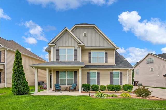 89 Revolutionary Rd, Cameron, NC 28326 - view of front of property featuring a front yard and board and batten siding