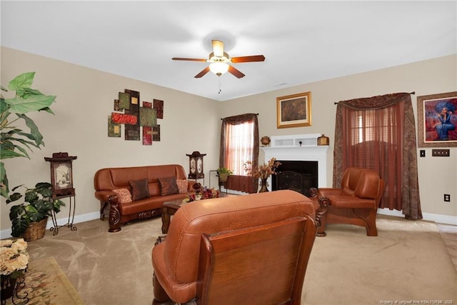 89 Revolutionary Rd, Cameron, NC 28326 - living room with light carpet, ceiling fan, baseboards, and a fireplace
