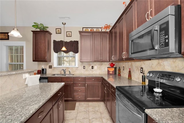89 Revolutionary Rd, Cameron, NC 28326 - kitchen featuring electric range, stainless steel microwave, a sink, tasteful backsplash, and decorative light fixtures