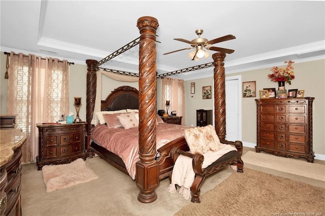 89 Revolutionary Rd, Cameron, NC 28326 - bedroom featuring light colored carpet, crown molding, multiple windows, a raised ceiling, and a ceiling fan
