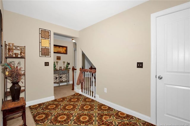 89 Revolutionary Rd, Cameron, NC 28326 - hallway featuring baseboards and an upstairs landing