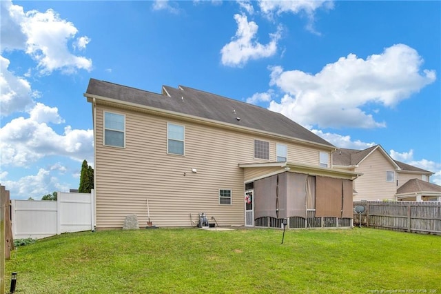 89 Revolutionary Rd, Cameron, NC 28326 - rear view of house featuring a sunroom