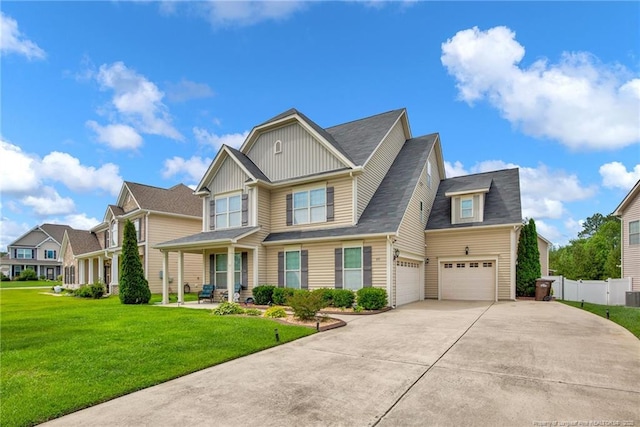 89 Revolutionary Rd, Cameron, NC 28326 - view of front facade with concrete driveway, board and batten siding, a garage, roof with shingles, and cooling unit