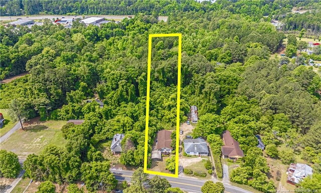 8212 Main St, West End, NC 27376 - aerial overview of property's location featuring a heavily wooded area and property boundaries highlighted