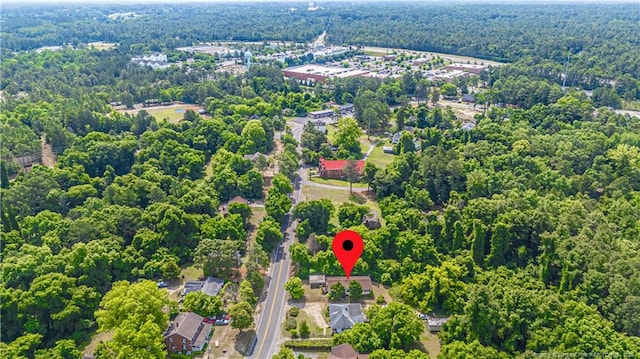 8212 Main St, West End, NC 27376 - aerial view of property's location with a heavily wooded area