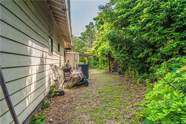 8212 Main St, West End, NC 27376 - view of yard with central air condition unit