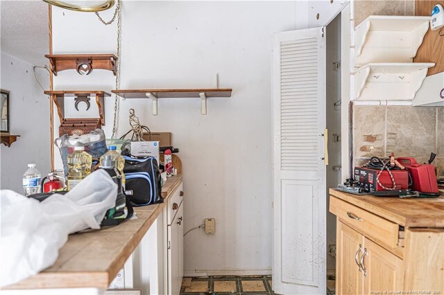 8212 Main St, West End, NC 27376 - kitchen with butcher block counters and open shelves