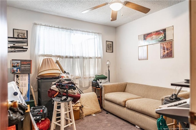 8212 Main St, West End, NC 27376 - rec room featuring carpet floors, a ceiling fan, and a textured ceiling