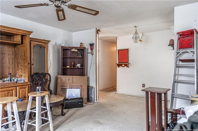 8212 Main St, West End, NC 27376 - interior space featuring a ceiling fan, unfinished concrete floors, and a textured ceiling