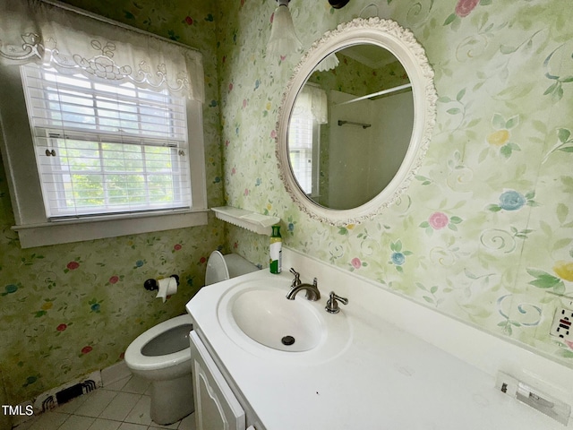 1609 Cypress Dr, Henderson, NC 27536 - bathroom featuring wallpapered walls, tile patterned flooring, vanity, toilet, and a shower