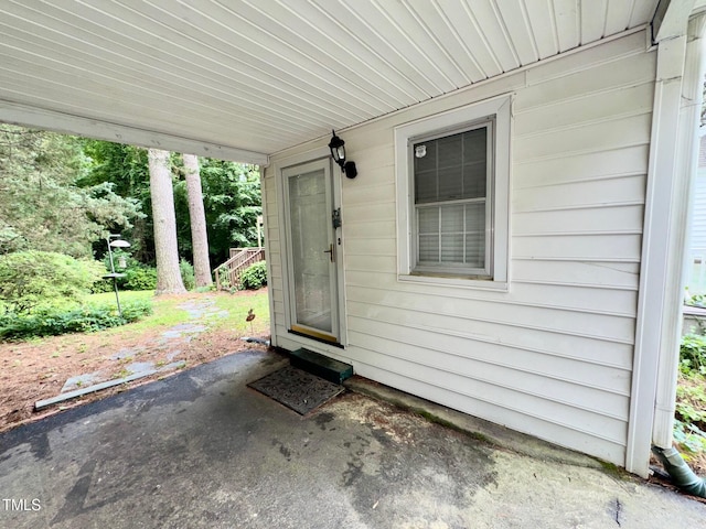 1609 Cypress Dr, Henderson, NC 27536 - view of exterior entry featuring a patio