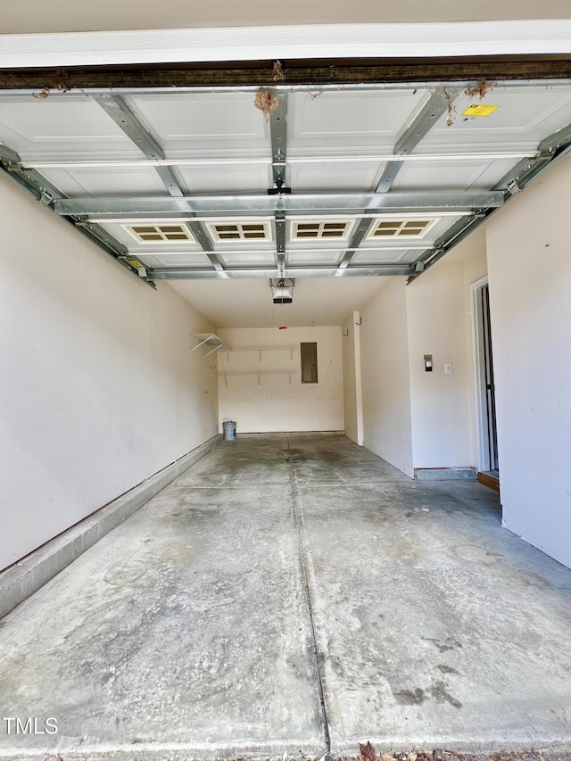 2118 Kedvale Ave, Raleigh, NC 27617 - garage with electric panel and a garage door opener