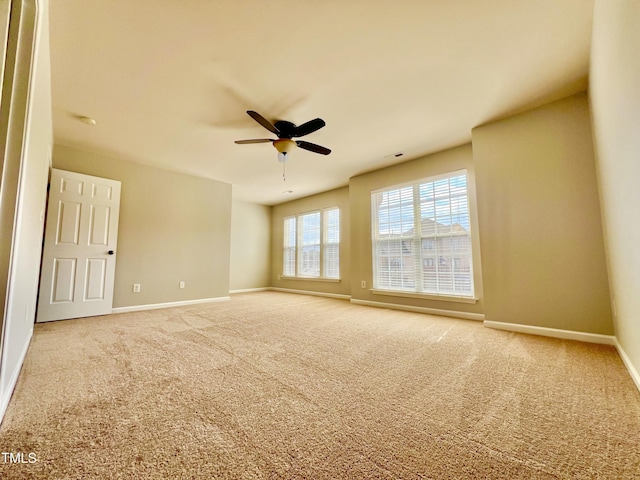 2118 Kedvale Ave, Raleigh, NC 27617 - spare room featuring carpet, baseboards, and a ceiling fan