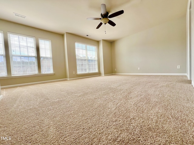 2118 Kedvale Ave, Raleigh, NC 27617 - carpeted spare room with baseboards and ceiling fan